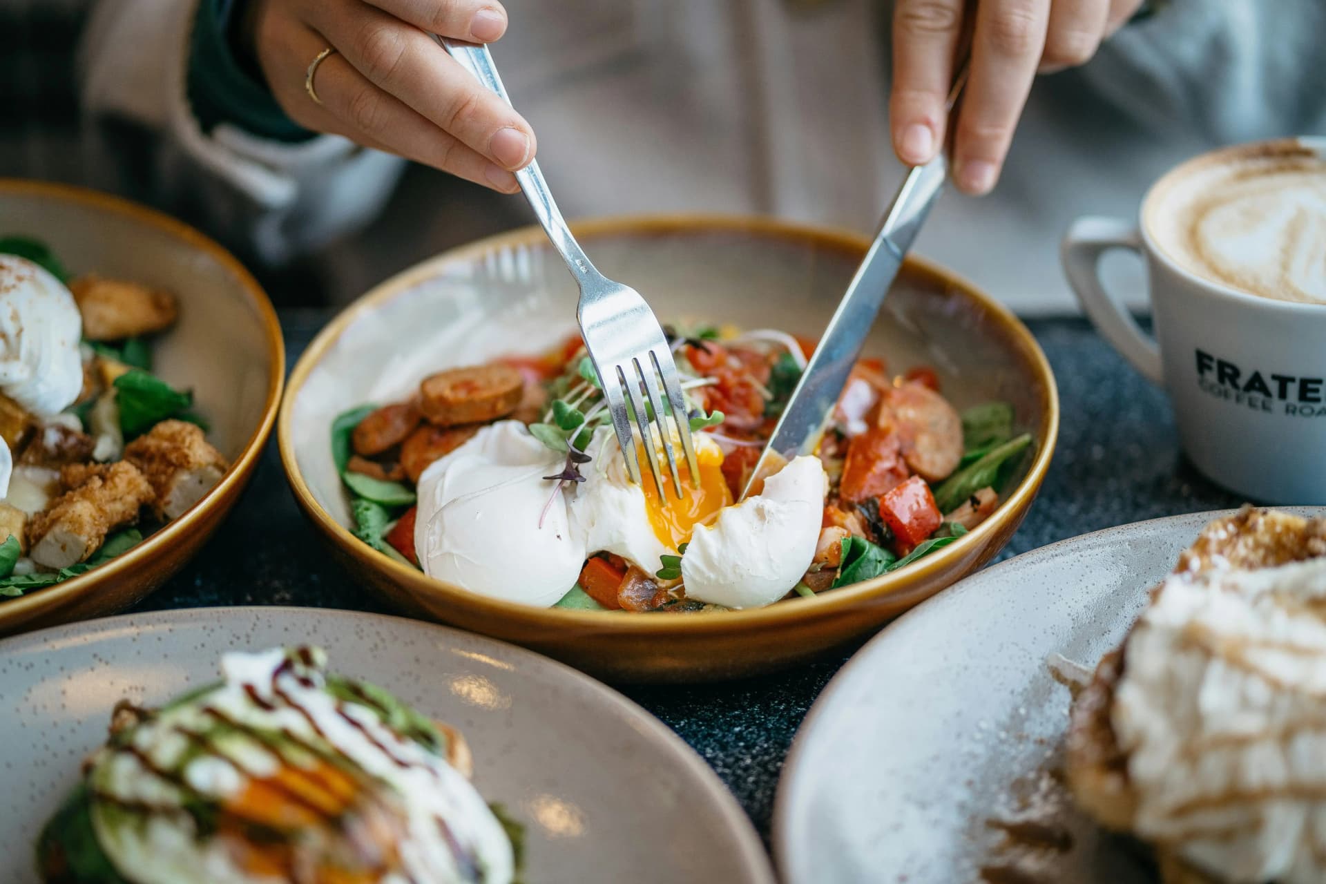 Person enjoying food in a brunch date