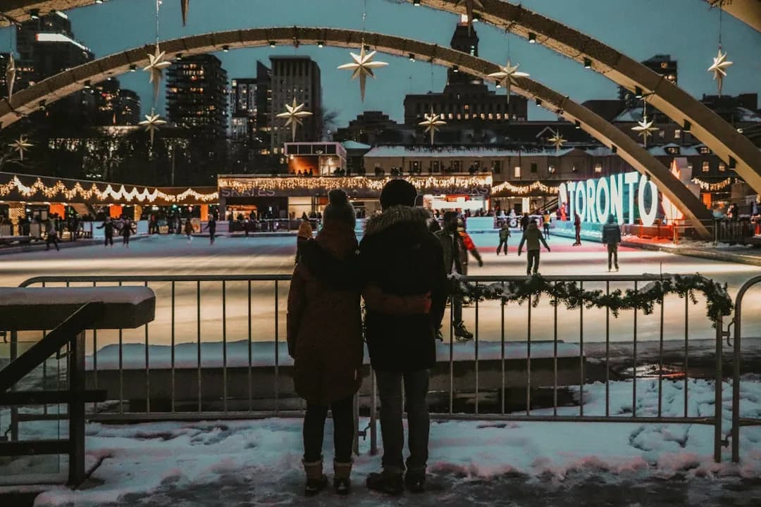 Man at an ice rink at night