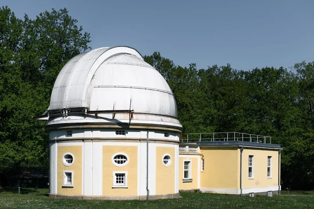 Observatory building in a park setting for a planetarium date