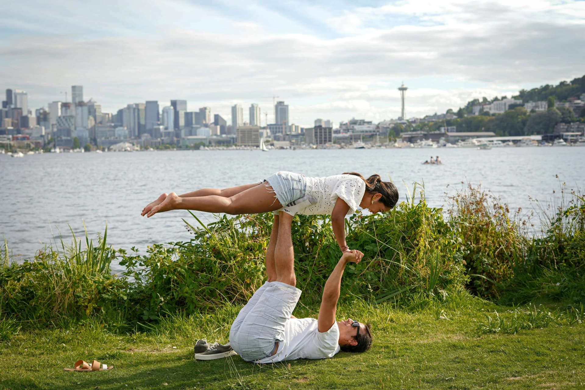 Couple practicing yoga together in a studio