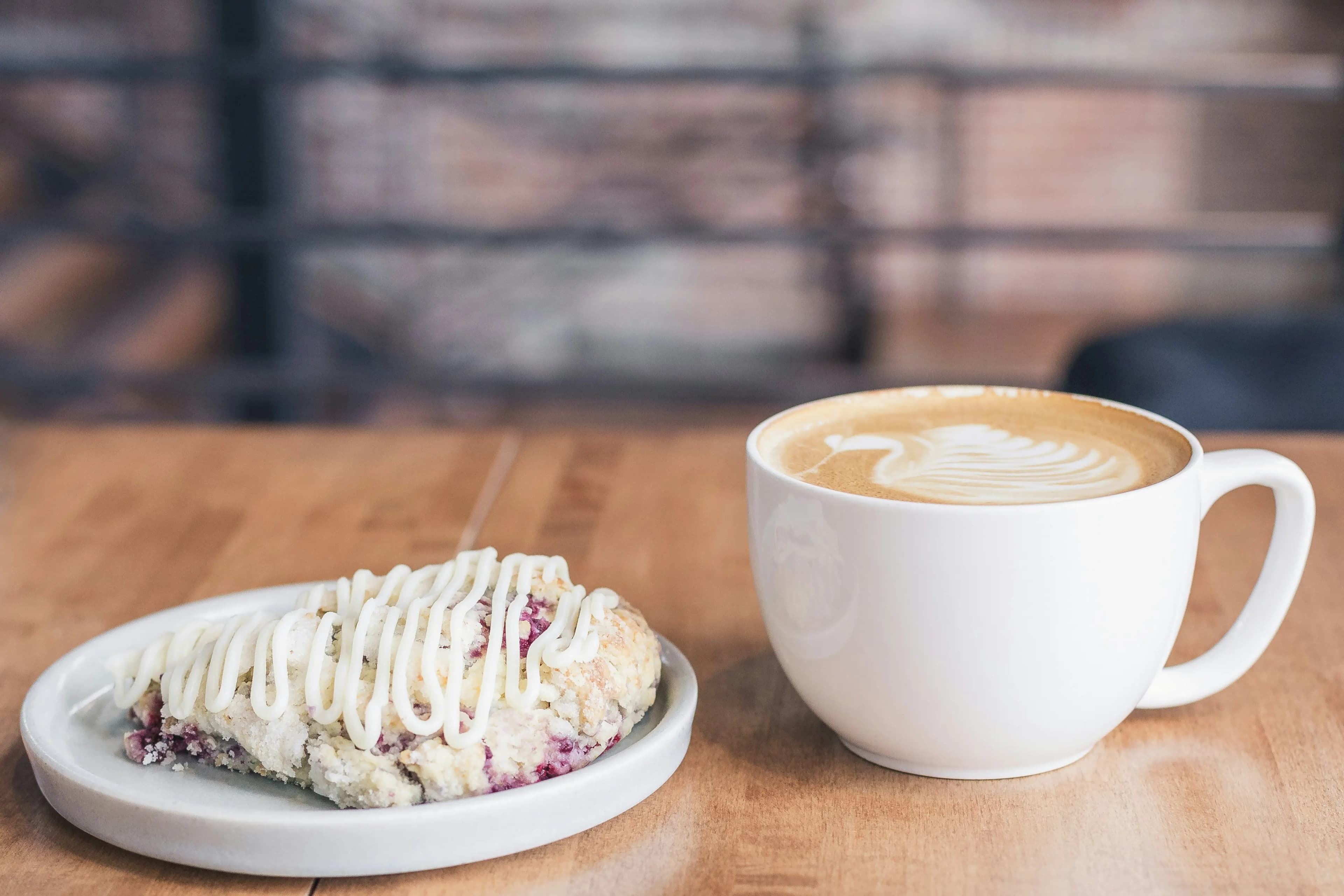 Coffee and dessert at a cafe table
