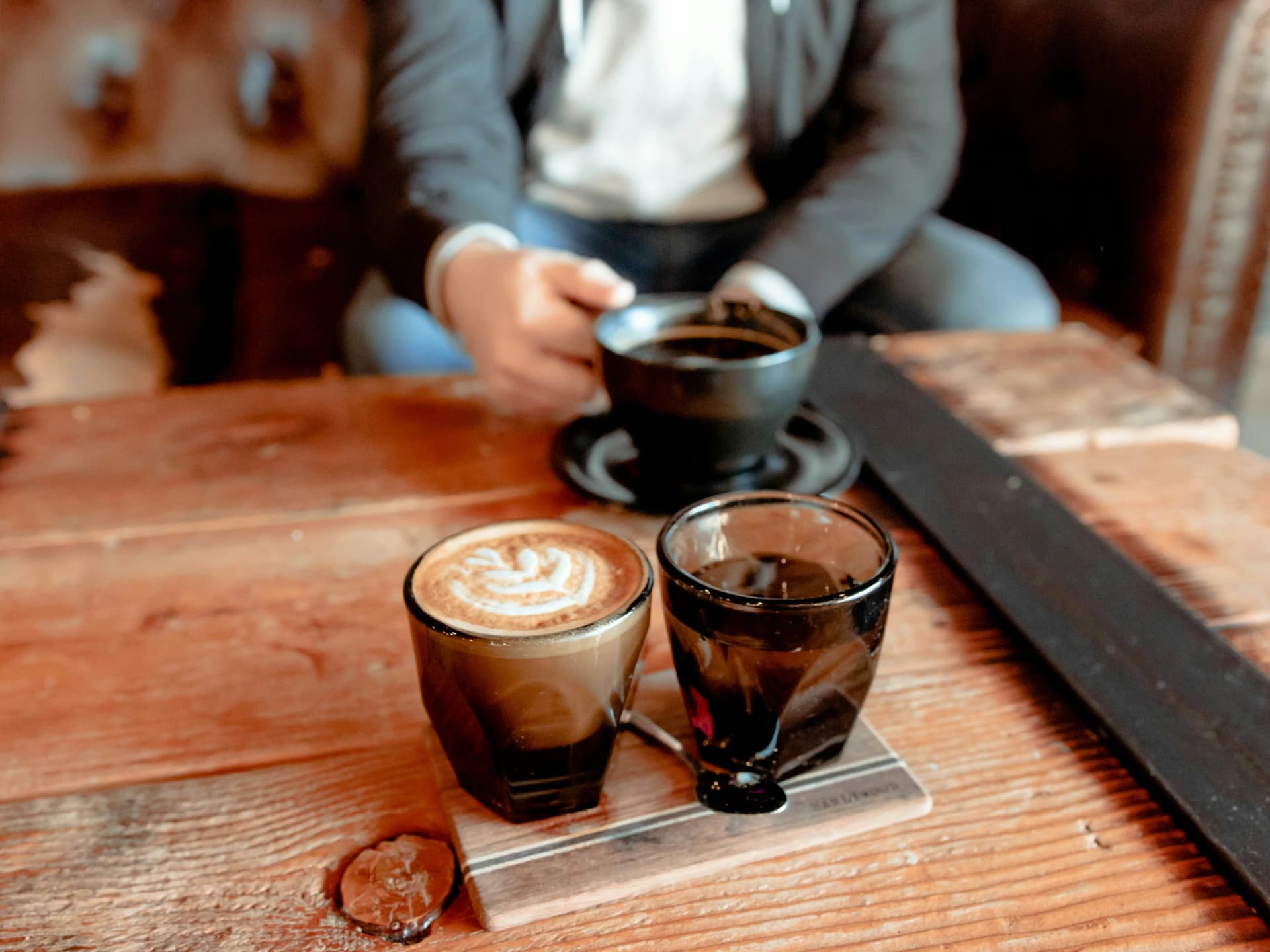 Couple enjoying coffee together at a cozy cafe