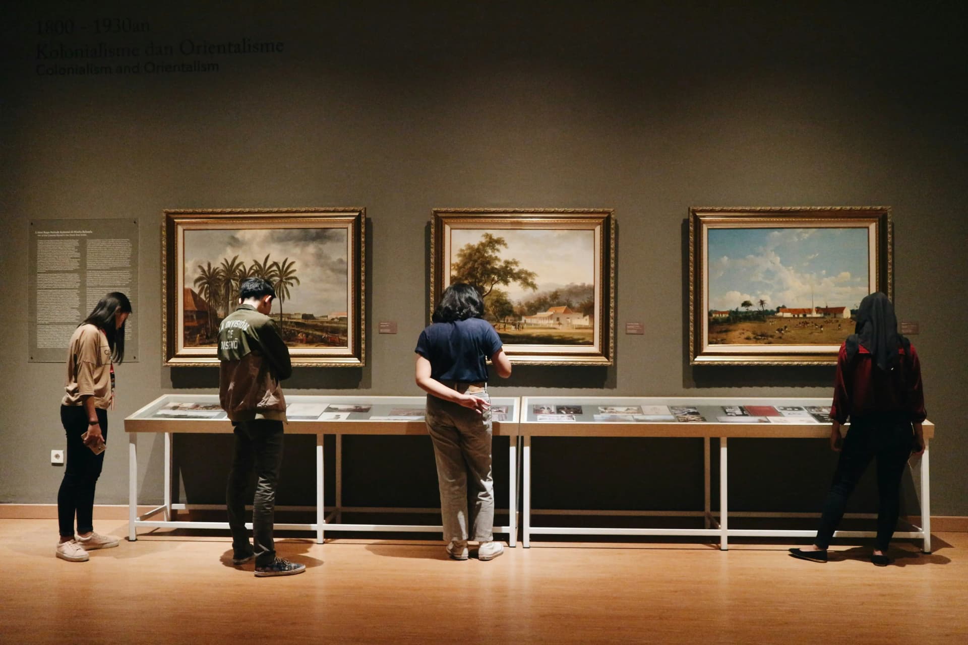 People visiting museum gallery