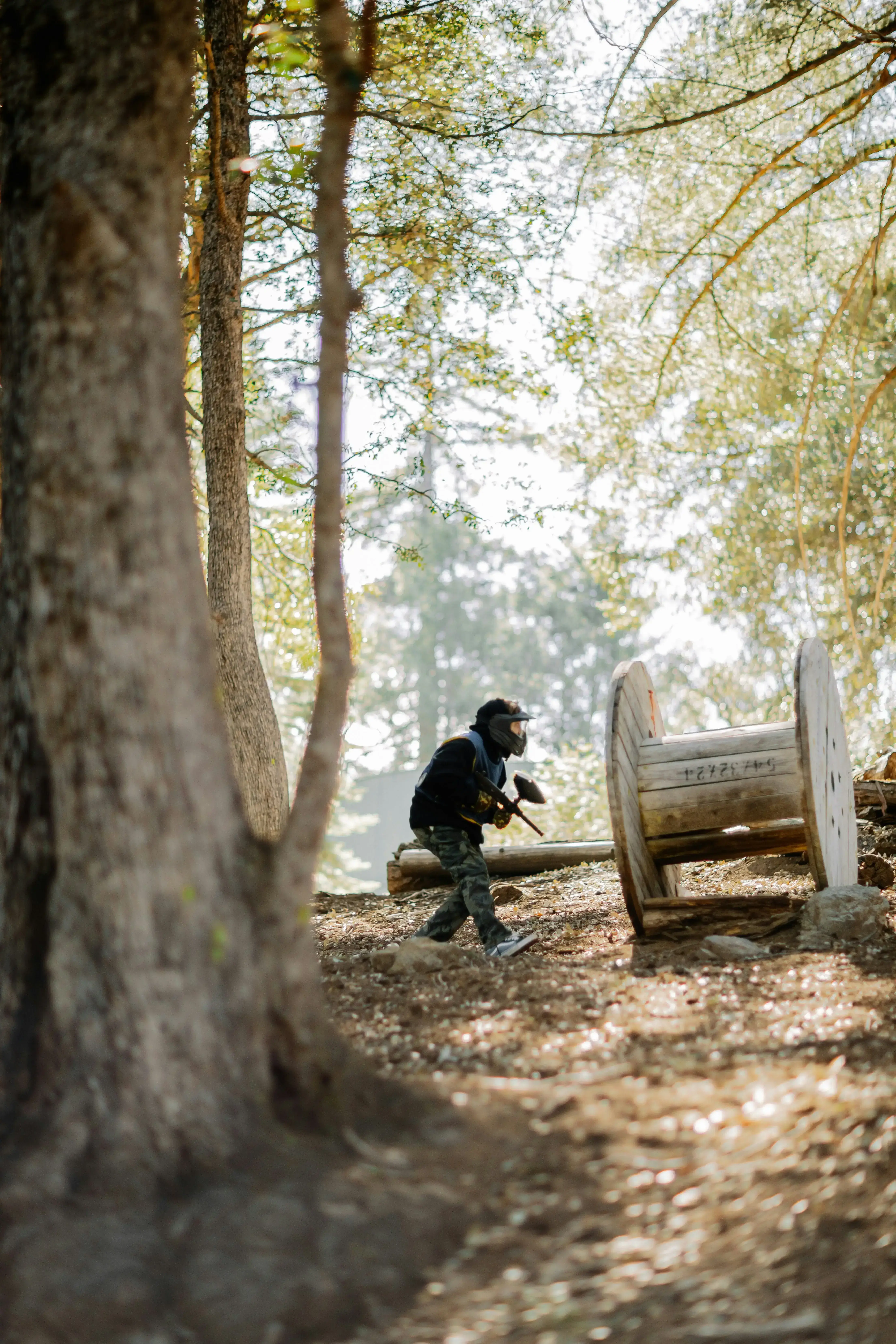 Paintball player moving through the field