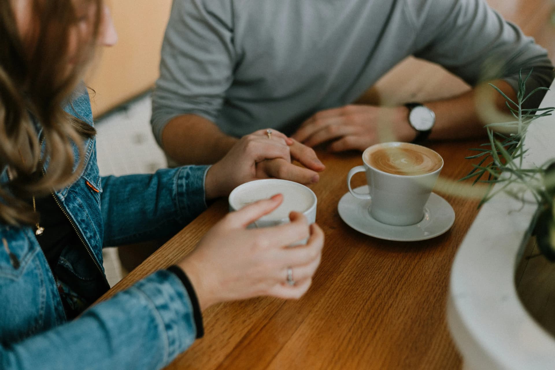 Couple enjoying coffee together at a cafe