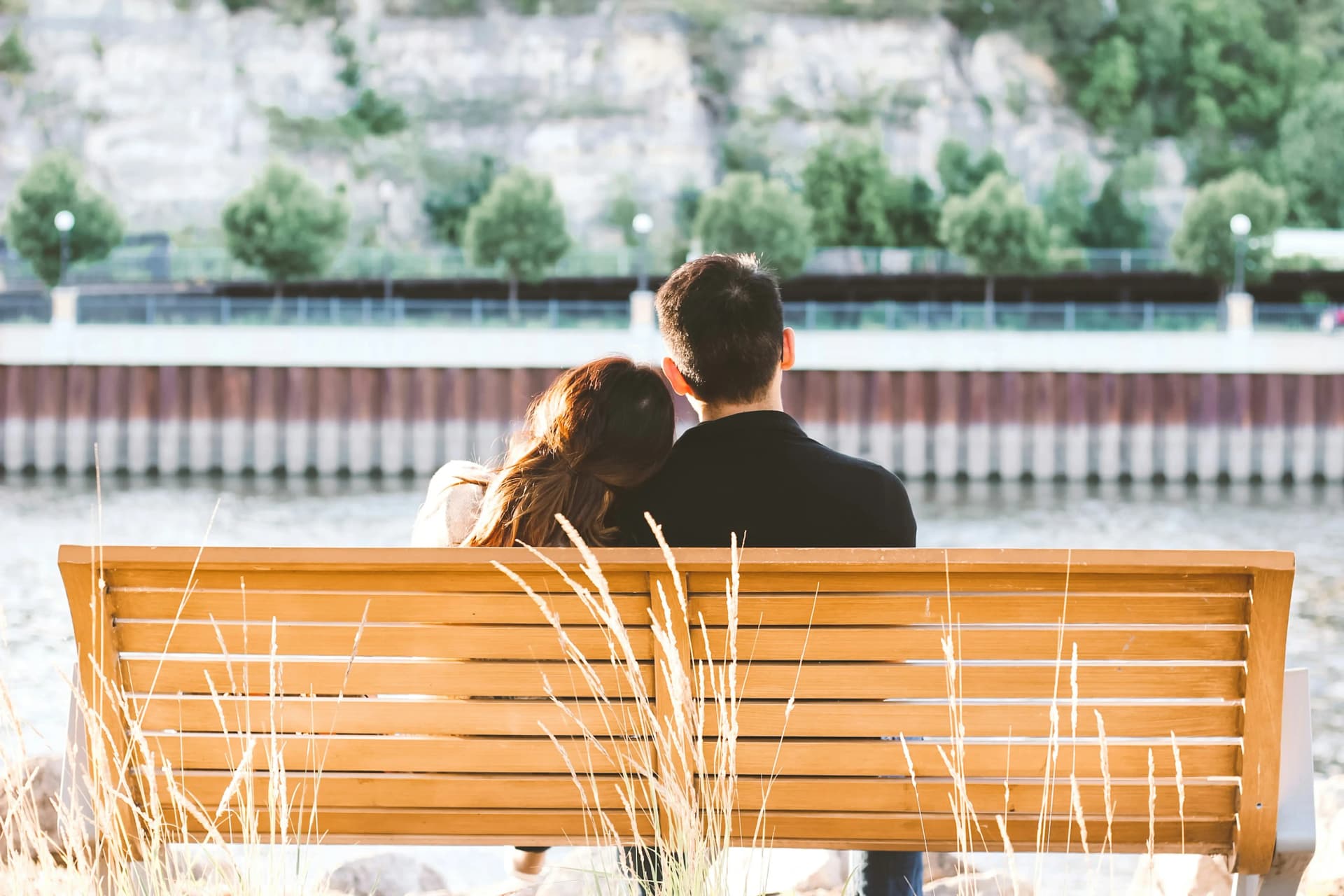 Couple sitting together outdoors