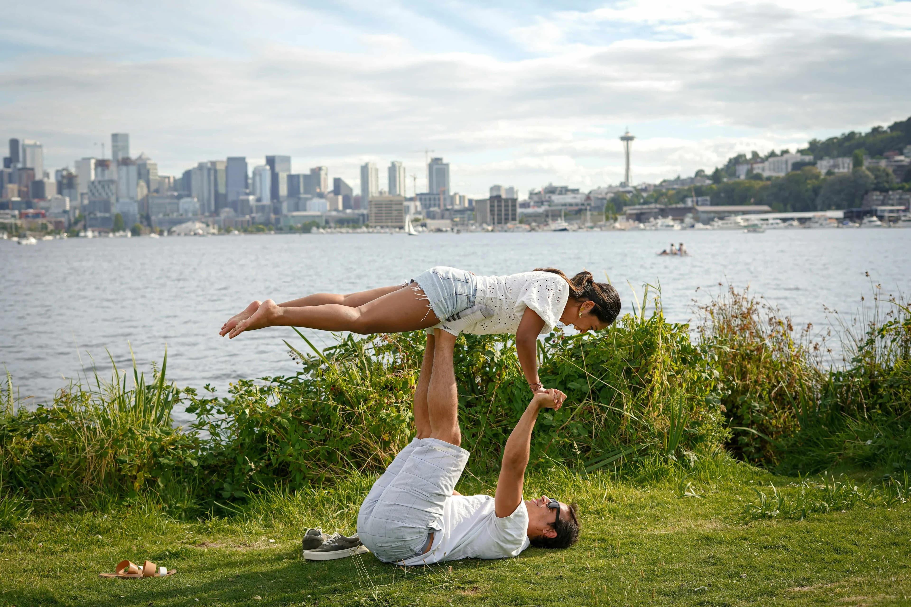 Couple practicing yoga together in a studio
